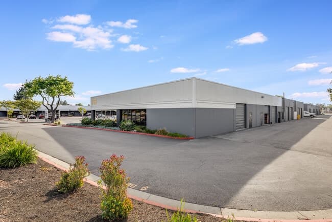 Grey Commercial Building with Number 780